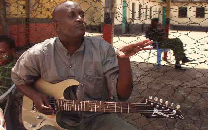 Katitu with a guitar