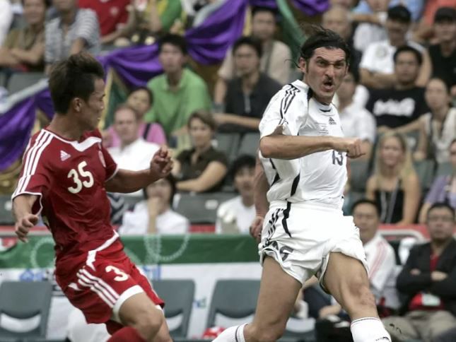 File image of former Manchester City footballer Mikheil Kavelashvili (in white) in action in a football game in 2006.