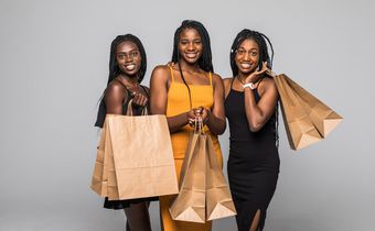 Young women with shopping bags