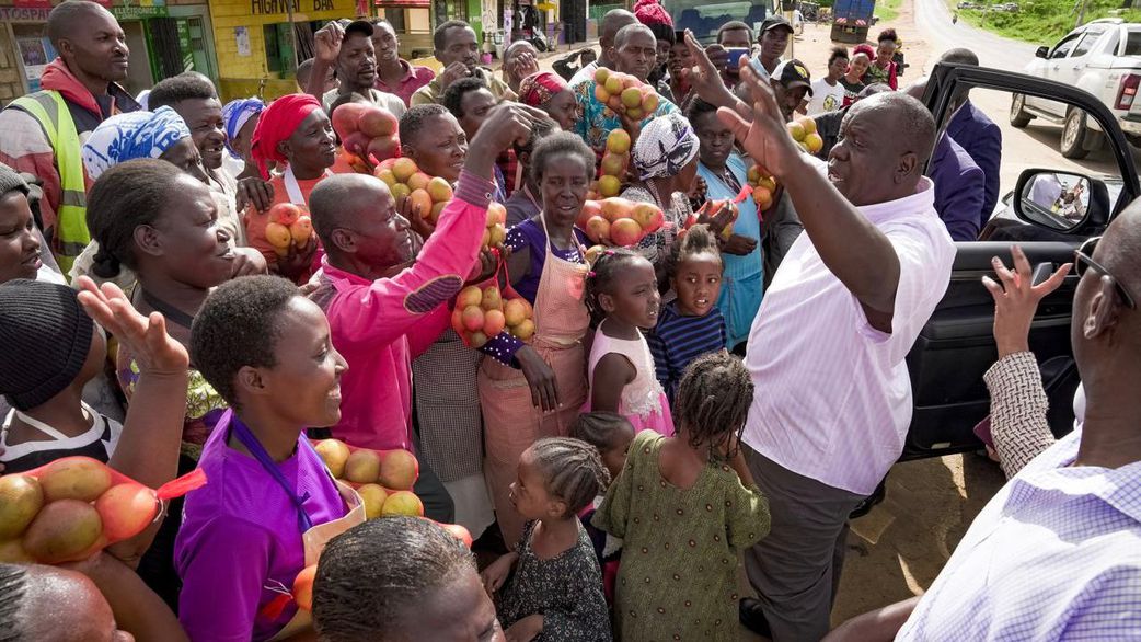 Former Interior CS Fred Matiang'i interacting with traders and purchasing local commodities in Kitui on December 20, 2024.