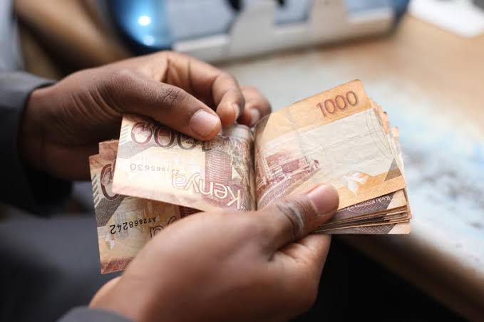 A person handling cash