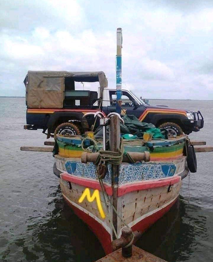 A police vehicle being transported on a boat