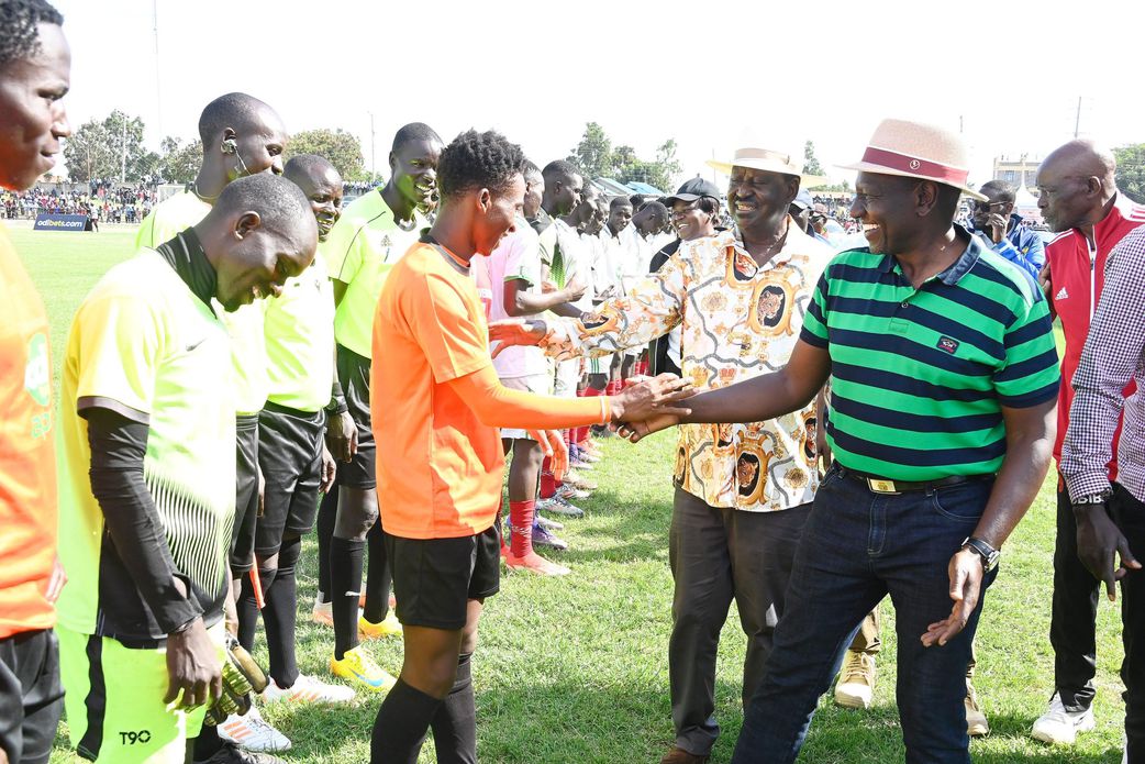 President William Ruto and Raila Odinga during the Odi Genowa Governor's Cup 2024 at the Raila Odinga Stadium in Homa Bay County