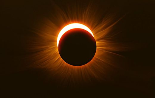 Mesopic vision kicks in the the last 4-5 minutes before a solar eclipse reaches totality, making red objects appear dark and muted while green objects stand out.Matt Anderson Photography / Getty Images