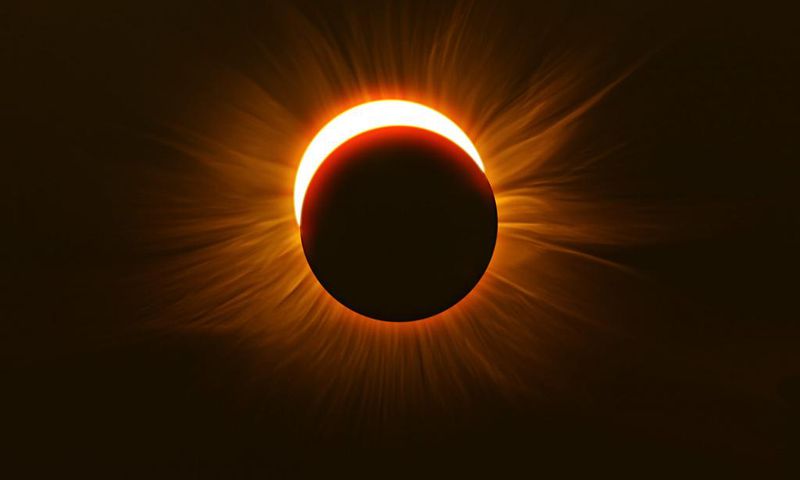 Mesopic vision kicks in the the last 4-5 minutes before a solar eclipse reaches totality, making red objects appear dark and muted while green objects stand out.Matt Anderson Photography / Getty Images