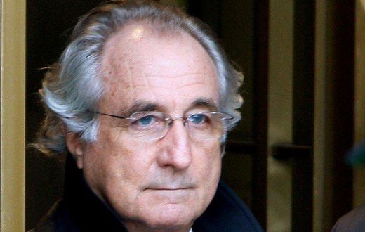 FILE PHOTO: Accused swindler Bernard Madoff exits the Manhattan federal court house in New York, U.S. on January 14, 2009. REUTERS/Brendan McDermid/File Photo