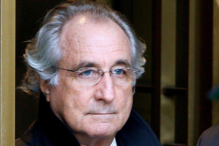 FILE PHOTO: Accused swindler Bernard Madoff exits the Manhattan federal court house in New York, U.S. on January 14, 2009. REUTERS/Brendan McDermid/File Photo