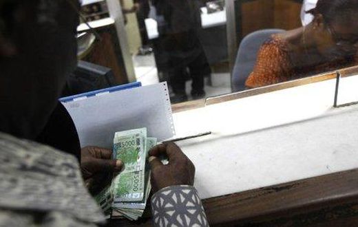 Taxe sur les transferts d'argent par téléphone mobile et des établissements de monnaie électronique