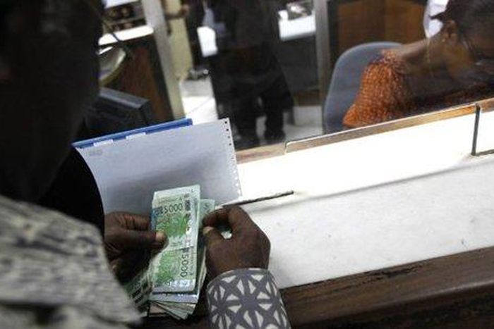 Taxe sur les transferts d'argent par téléphone mobile et des établissements de monnaie électronique