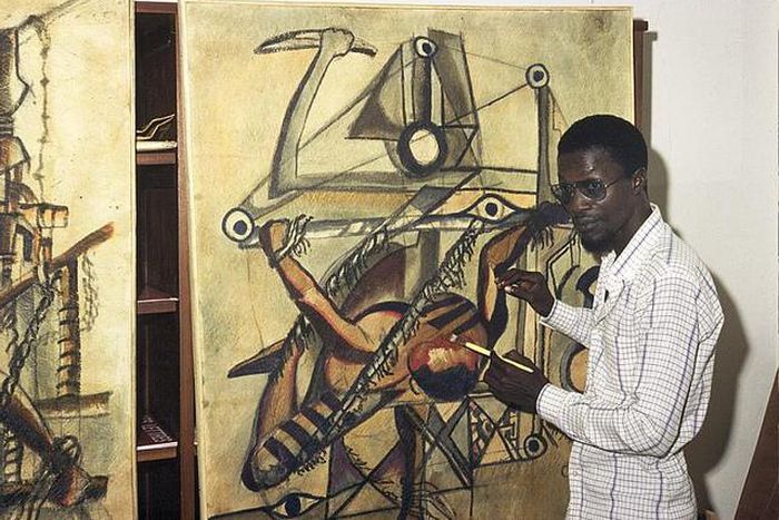 Ba Youssouf peignant une toile Vohou