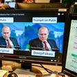 The FBI said on Tuesday that more people were using deepfake videos during job interviews. In this image, a person views a deepfake video on January 25, 2019, manipulated with artificial intelligence to potentially deceive viewers.