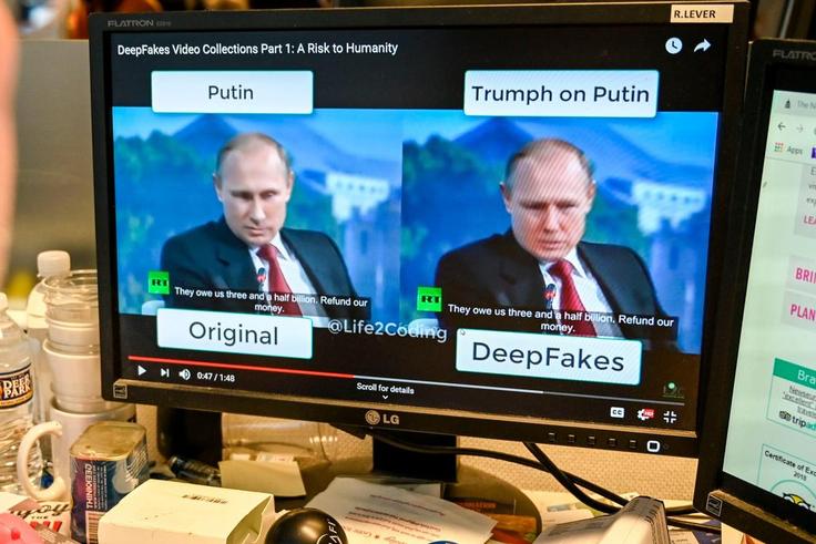 The FBI said on Tuesday that more people were using deepfake videos during job interviews. In this image, a person views a deepfake video on January 25, 2019, manipulated with artificial intelligence to potentially deceive viewers.