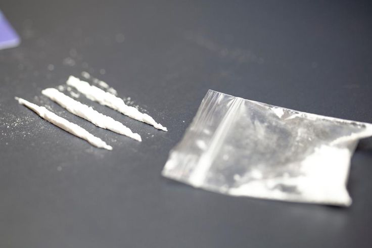A stock photo shows a bag of cocaine with lines of the drug.Getty Images