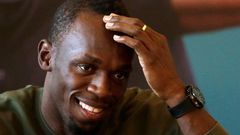 Jamaican sprinter Usain Bolt reacts during a news conference before the Ostrava Golden Spike athletics meeting, in Prague, Czech Republic, May 18, 2016.
