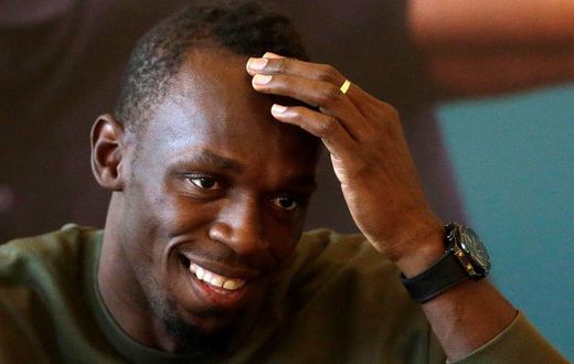 Jamaican sprinter Usain Bolt reacts during a news conference before the Ostrava Golden Spike athletics meeting, in Prague, Czech Republic, May 18, 2016.