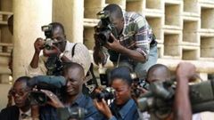 Des journalistes en reportage