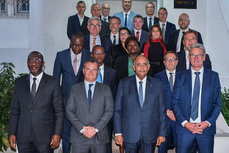 Le Groupe Auchan à travers son président venu annoncer l'ouverture des magasins Auchan en Côte d'Ivoire au Premier Ministre ivoirien Patrick Achi