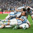 Messi's teammates piled on him when he scored Argentina's opener.Getty/Dan Mullan