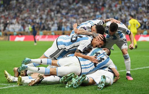 Messi's teammates piled on him when he scored Argentina's opener.Getty/Dan Mullan