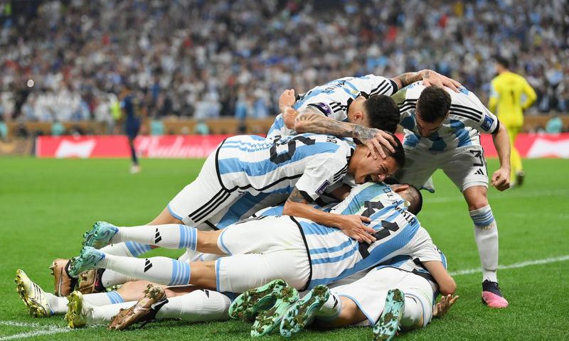 Messi's teammates piled on him when he scored Argentina's opener.Getty/Dan Mullan