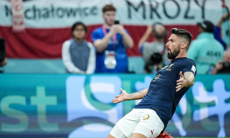 Olivier Giroud of team France celebrates after scoring first goal during the FIFA World Cup Qatar 2022 Round of 16 match between France and Poland at Al Thumama Stadium on December 4, 2022.