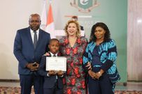 Georges-Antoine Sinzai Trystan BOLAMO avec ses parents et la Première Dame