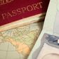 A vintage US map, passport and visa.belterz/Getty Images