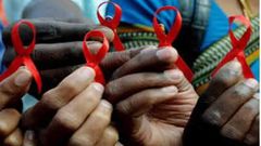 Le ruban rouge : lutte contre le VIH-SIDA