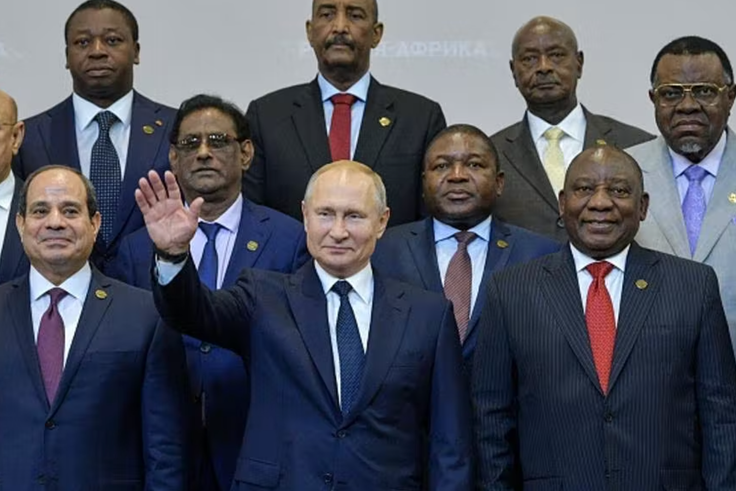 Photo de Poutine entouré de dirigeants du monde