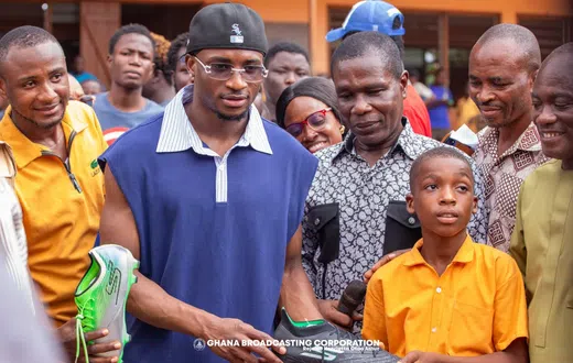 Kudus donates books, sports kits to Nima Basic 1, urges students to prioritize education
