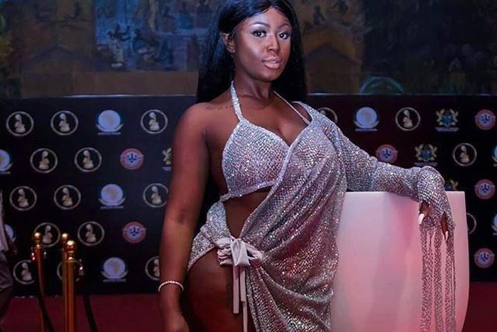 Nina Richie  attends 2018 AFRIMA in a near-naked dress