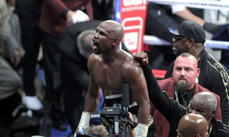 Mayweather heads into retirement with a record 50th straight victory