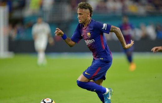 Neymar of Barcelona vies for the ball with Real Madrid during their International Champions Cup football match at Hard Rock Stadium on July 29, 2017 in Miami, Florida