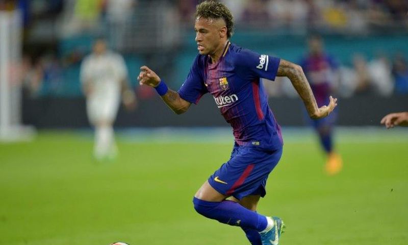 Neymar of Barcelona vies for the ball with Real Madrid during their International Champions Cup football match at Hard Rock Stadium on July 29, 2017 in Miami, Florida
