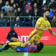 Olivier Giroud (top), pictured colliding with Crystal Palace's James Tomkins, joined a growing Chelsea injury-list during a 1-0 win at Selhurst Park in a Premier League match on Sunday