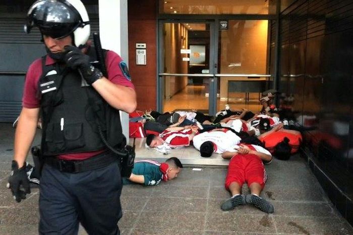 Brazilian security forces detained River Plate supporters during clashes near the Monumental stadium in Buenos Aires.