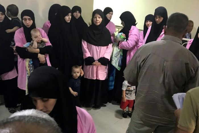Thirty children belonging to Russian women who have been sentenced to life in prison on grounds of joining the Islamic State (IS) group (pictured in Baghdad's Central Criminal Court in April 2018) have arrived in Moscow