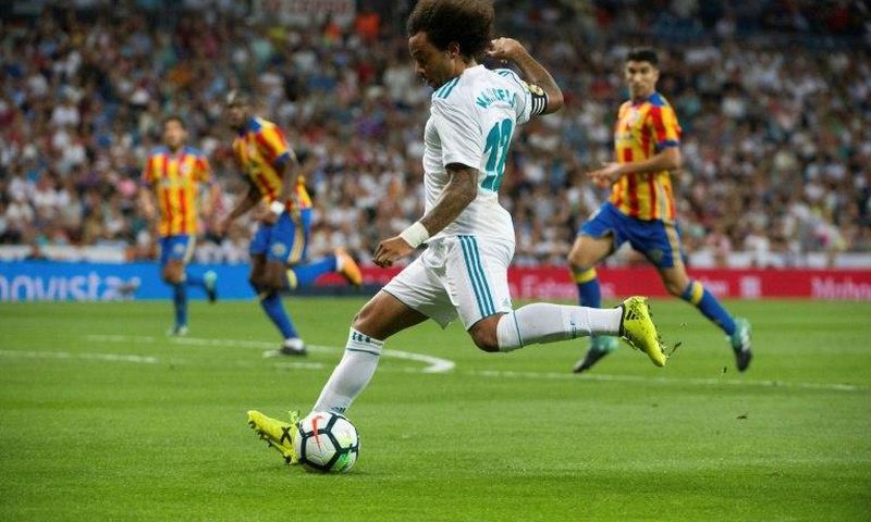 Real Madrid's defender Marcelo prepares to kick the ball during the Spanish league football match against Valencia August 27, 2017