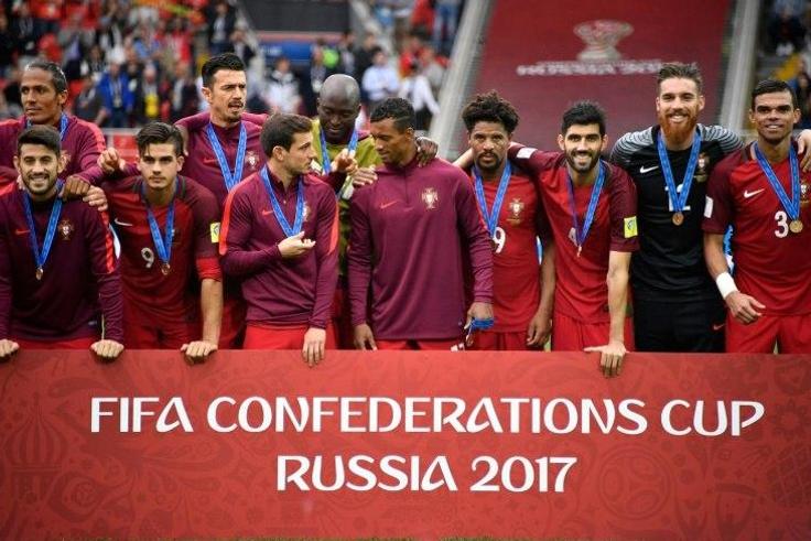 Portugal's players pose with their bronze medals after beating Mexico during a third-place play-off at the Confederations Cup in Moscow, on July 2, 2017