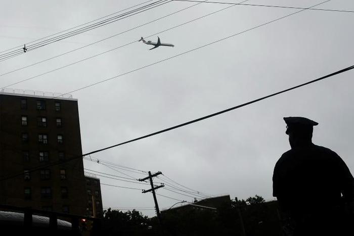 A police officer stands on patrol in New York City