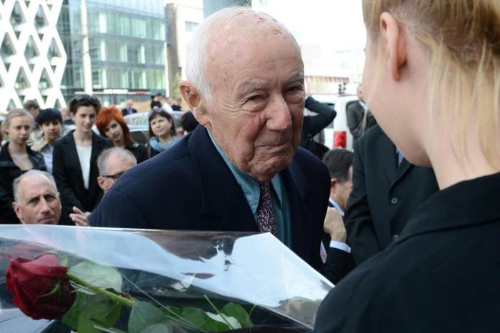 In this file photo taken on April 18, 2013, Simcha "Kazik" Rotem is welcomed as he revisits the sewer he and dozens of comrades used to escape the Nazis during the 1943 Warsaw ghetto uprising