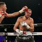 Andre Ward (L) battles Sergey Kovalev during their light heavyweight championship bout at the Mandalay Bay Events Center in Las Vegas, Nevada