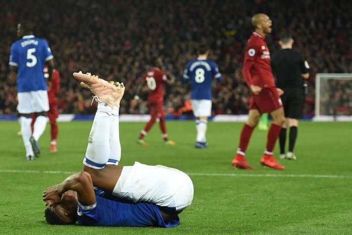 Liverpool celebrate their late win against Everton at Anfield