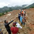 Rescue workers search for survivors at the site of a landslide triggered by heavy rain, in Sukabumi, Indonesia's West Java province, on January 1, 2019
