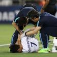 South Korea's Son Heung-Min receives medical treatment during the World Cup qualifier against Qatar in Doha on June 13, 2017