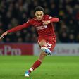 Liverpool's English defender Trent Alexander-Arnold scored a stunning free-kick in a 3-0 win at Watford