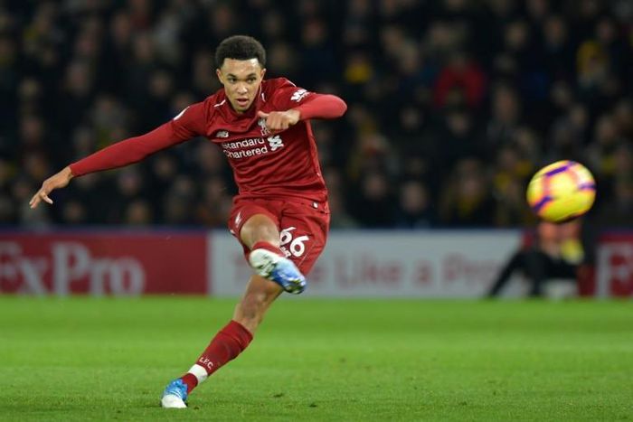 Liverpool's English defender Trent Alexander-Arnold scored a stunning free-kick in a 3-0 win at Watford
