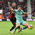 Bournemouth's Callum Wilson tangles with Arsenal's Sokratis Papastathopoulos