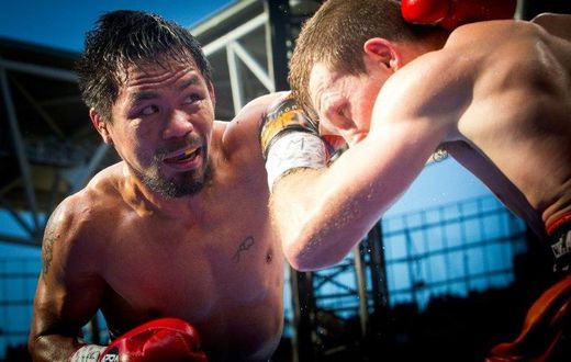 Manny Pacquiao (L) of the Philippines has declared he will return for a rematch