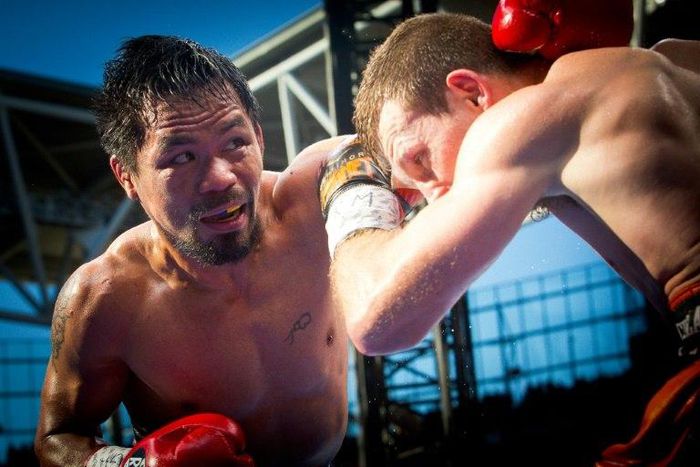 Manny Pacquiao (L) of the Philippines has declared he will return for a rematch